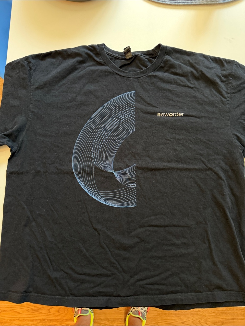 New Order LA event  Black Short-Sleeve Tee with Blue Geometric Graphic